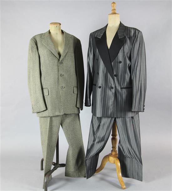 A collection of mixed gentlemens suits, in mixed patterns, colours and sizes